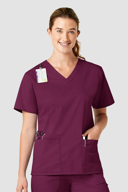 Tunique médicale Wonderwork en violet avec v-neck, poches et fentes latérales